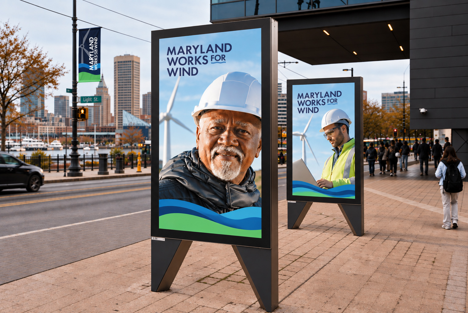 Maryland Works for Wind recruitment posters at an outdoor transit shelter
